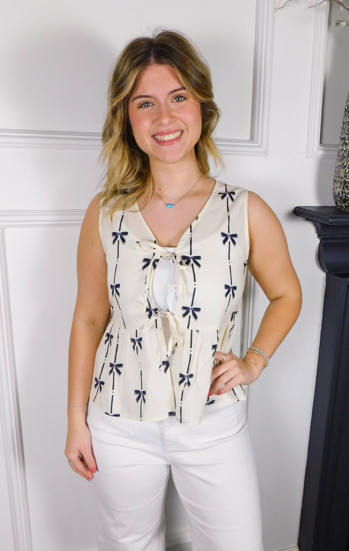 Cream Bow Printed Sleeveless Ruffle Top